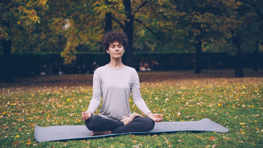 person doing meditation outdoors