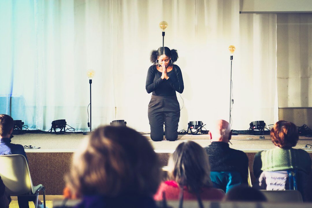woman speaking confidently on stage